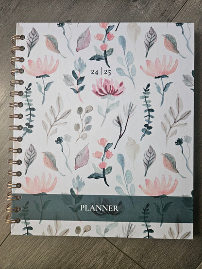 Agenda hebdomadaire à fleurs vertes 2025